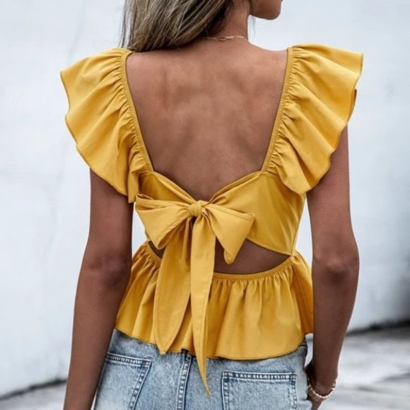 Contemporary minimalist Ruffle Sleeve Peplum Tie Back Blouse - Picture 2 of 6